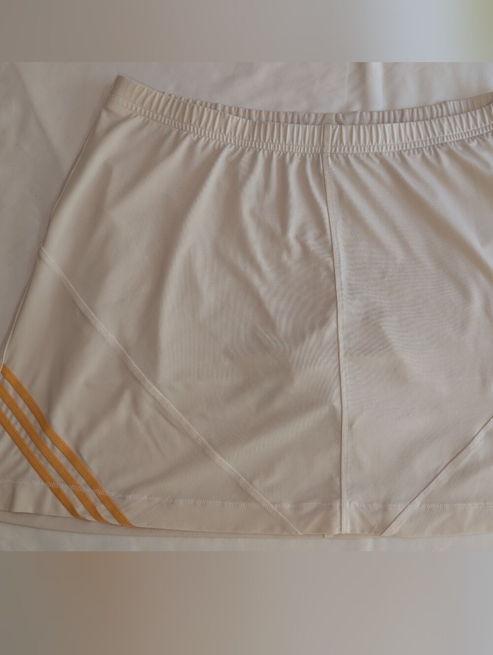 adidas White Women’s Athletic Skort with Gold Stripe